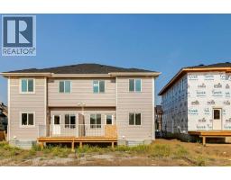 134 Heartland Street, Cochrane, AB T4C3L9 Photo 29