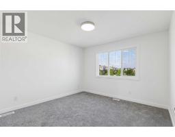 134 Heartland Street, Cochrane, AB T4C3L9 Photo 21