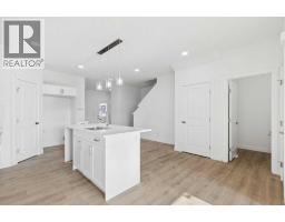 4pc Bathroom - 134 Heartland Street, Cochrane, AB T4C3L9 Photo 6