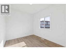 Laundry room - 134 Heartland Street, Cochrane, AB T4C3L9 Photo 12