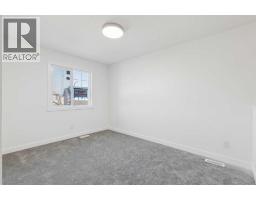 134 Heartland Street, Cochrane, AB T4C3L9 Photo 19