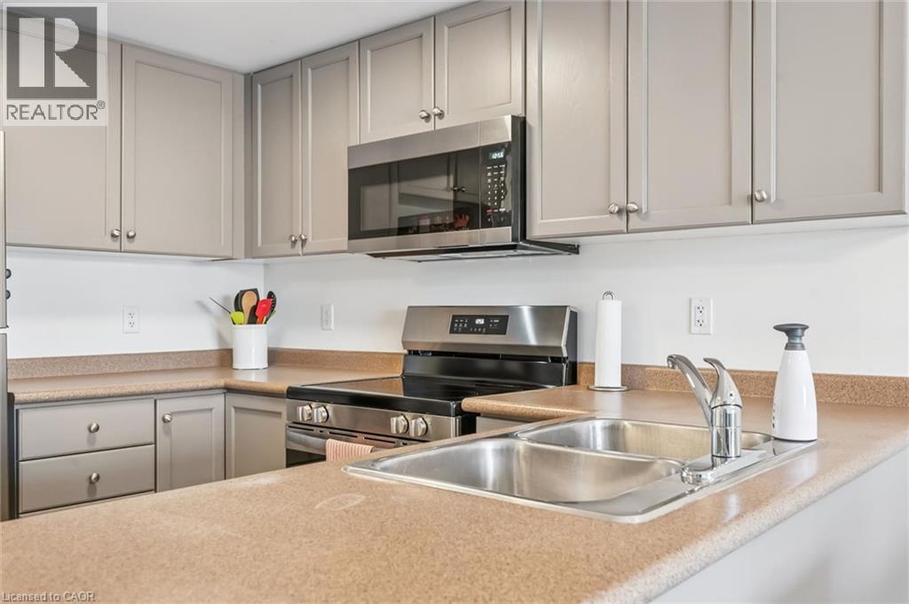 19 WATERFORD Drive Unit# 214, Guelph — photo 7