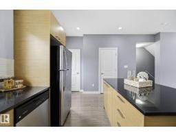 Bedroom 2 - #23 655 Watt Bv Sw, Edmonton, AB T6X0Y2 Photo 6