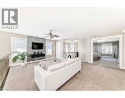 Family room - 120 Kinniburgh Circle, Chestermere, AB T1X0P8 Photo 21