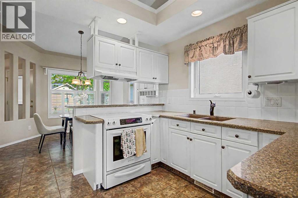 26 Mt Mckenzie Villas SE, McKenzie Lake, Calgary photo 5