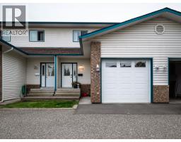 Primary bedroom of 102 7180 ST LAWRENCE AVENUE · Prince George, BC