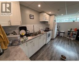 Primary bedroom of 1125-1127 AHBAU STREET · Prince George, BC