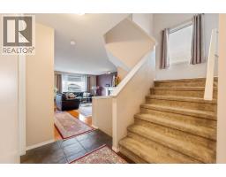 Living room - 20 Saddlecrest Terrace Ne, Calgary, AB T3J5L4 Photo 6