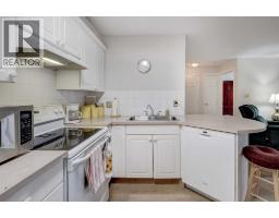 Primary Bedroom - 101, 6800 Hunterview Drive Nw, Calgary, AB T2K6K5 Photo 7