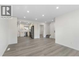 Living room - 3504 33 Street Se, Calgary, AB T2B2C2 Photo 7