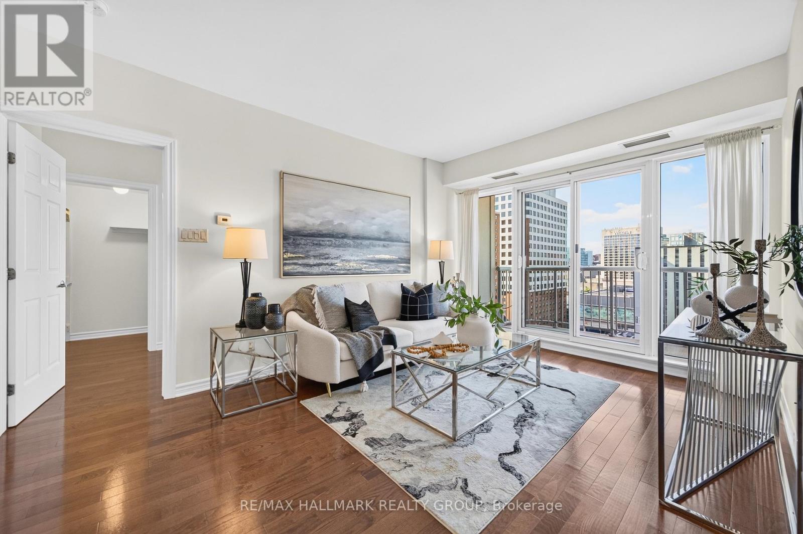 Living room with balcony views 1