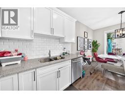 Dining room - 446 Windrow Common Sw, Airdrie, AB T4B4K2 Photo 6