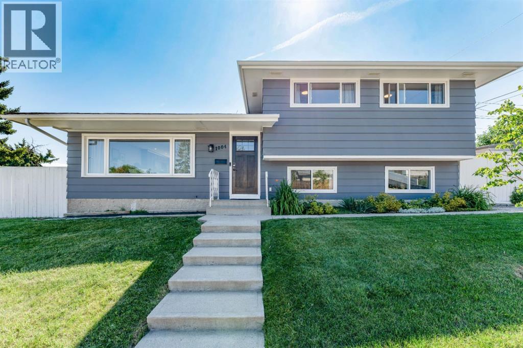 1004 Huntercove Place NW, Calgary — photo 2