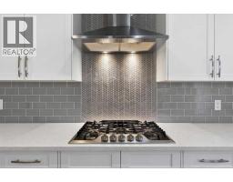 Family room - 109 Kinniburgh Cove, Chestermere, AB T1X0Y6 Photo 11