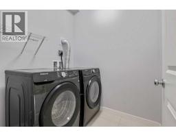 22 West Coach Manor Sw, Calgary, AB T3H1R7 Photo 20