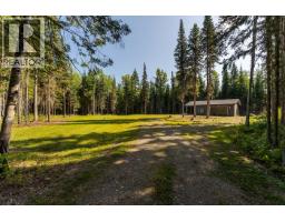Primary bedroom of 14975 NUKKO LAKE ESTATES ROAD · Prince George, BC