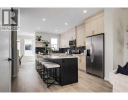 Laundry room - 88 Bluerock Terrace Sw, Calgary, AB T2Y0V7 Photo 11