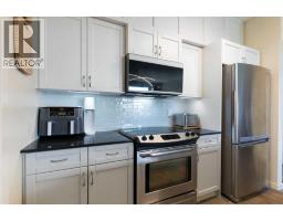 202, 141 Mountain Street, Cochrane, AB T4C1Z5 Photo 11