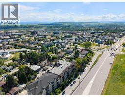 202, 141 Mountain Street, Cochrane, AB T4C1Z5 Photo 39