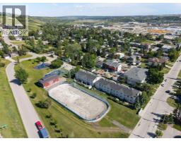 202, 141 Mountain Street, Cochrane, AB T4C1Z5 Photo 41