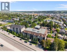 202, 141 Mountain Street, Cochrane, AB T4C1Z5 Photo 42