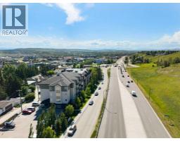 202, 141 Mountain Street, Cochrane, AB T4C1Z5 Photo 43