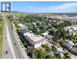 202, 141 Mountain Street, Cochrane, AB T4C1Z5 Photo 44