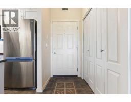 Primary Bedroom - 202, 141 Mountain Street, Cochrane, AB T4C1Z5 Photo 6