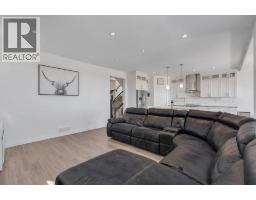 Family room - 118 Reunion Green Nw, Airdrie, AB T4B3X1 Photo 13