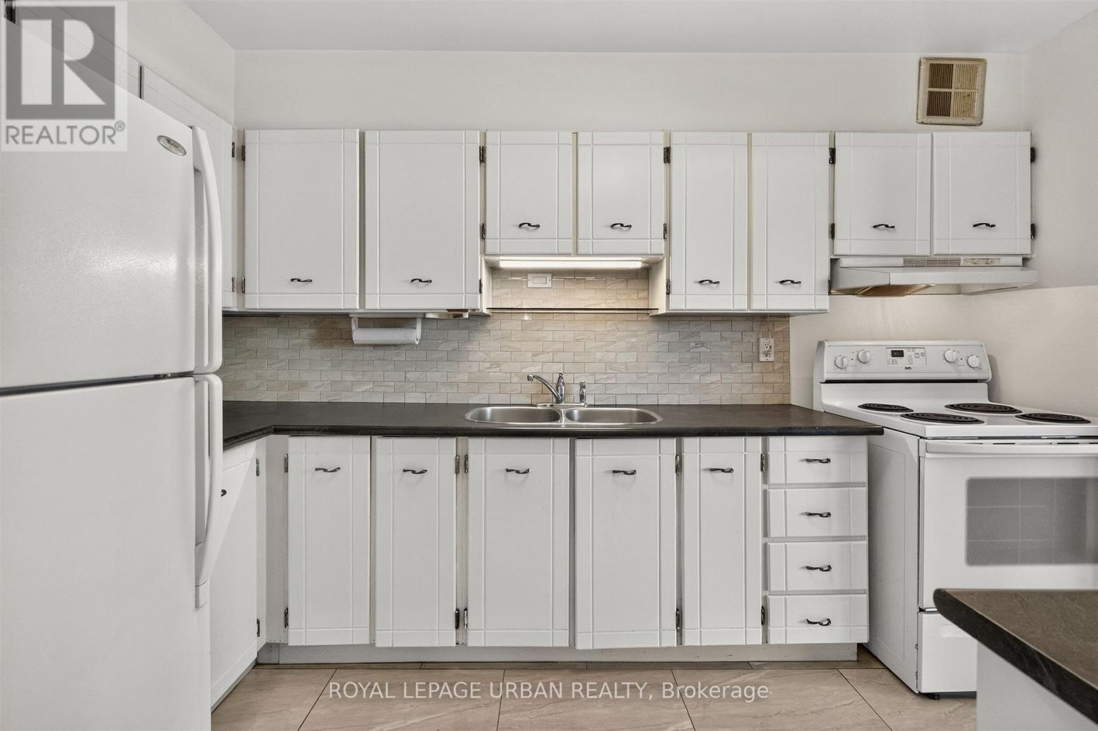 #703 1135 LOGAN AVENUE - 21
