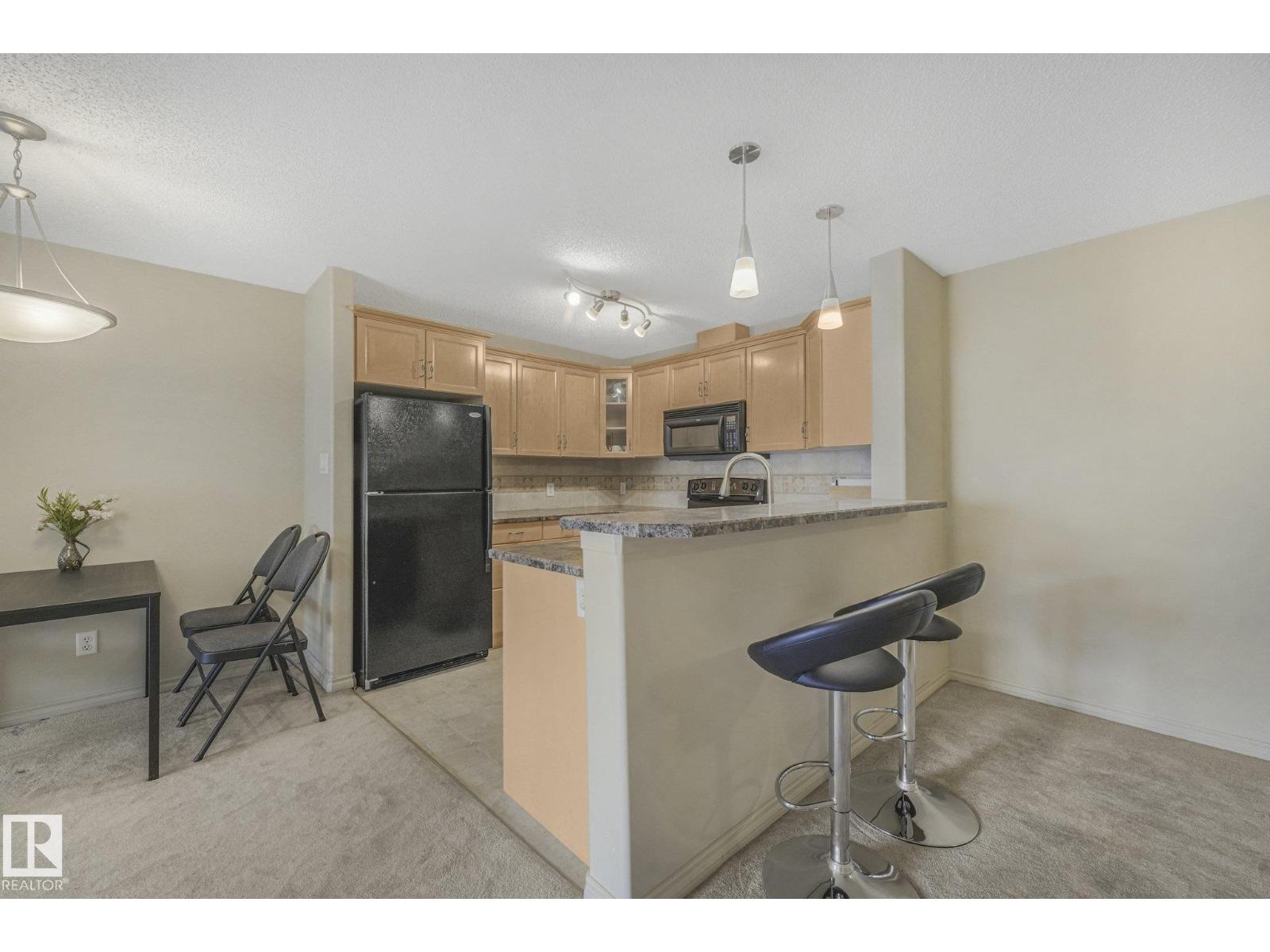 #311 17407 99 AV NW - 18
