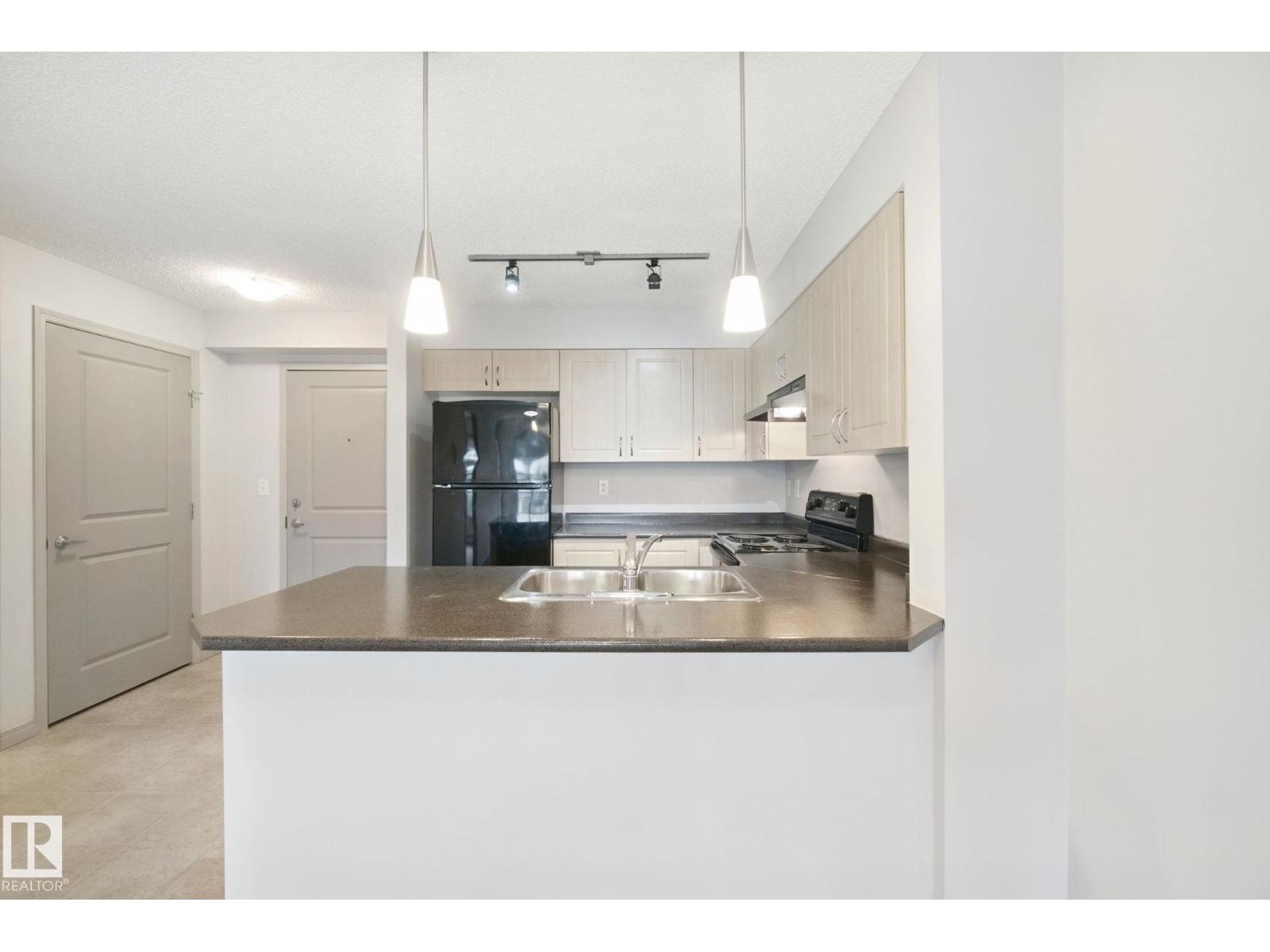 #406 11449 ELLERSLIE RD SW - 23