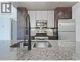 Laundry room - 902, 220 12 Avenue Se, Calgary, AB T2G0Z7 Photo 6