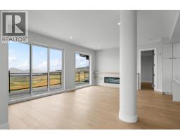 Living room - 75 Predator Ridge Drive Unit# 502, Vernon, BC V1H1G4 Photo 7