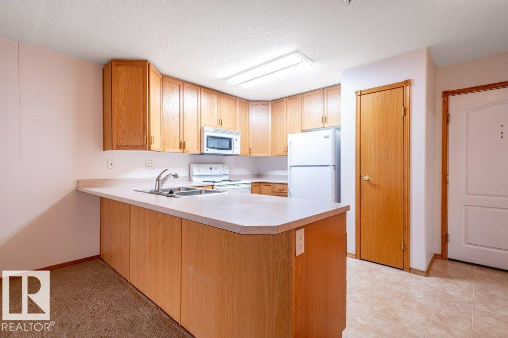 #203 8912 156 ST NW - 19