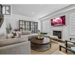 Family room - 2400 Spring Meadow Way, Oakville, ON L6M0R6 Photo 8