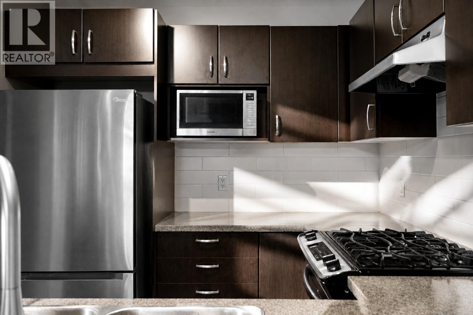 Photo of 306 3050 DAYANEE SPRINGS BOULEVARD 8