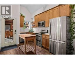 Living room - 307, 343 Marten Street, Banff, AB T1L1C7 Photo 6
