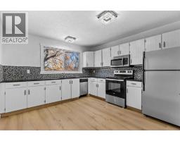 7006A Bowness Road NW - photo 1