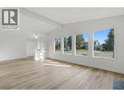 Primary Bedroom - 731 Queensland Drive Se, Calgary, AB T2J4S8 Photo 10