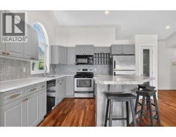 Laundry room - 21 Strathearn Gardens Sw, Calgary, AB T3H2R1 Photo 7
