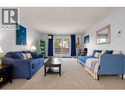 Living room - 216 3235 Quadra St, Saanich, BC V8X1G4 Photo 6