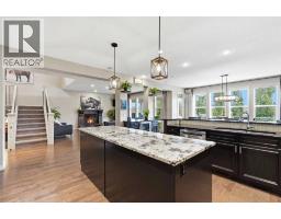 Kitchen - 176 Ridge View Close, Cochrane, AB T4C0J2 Photo 6
