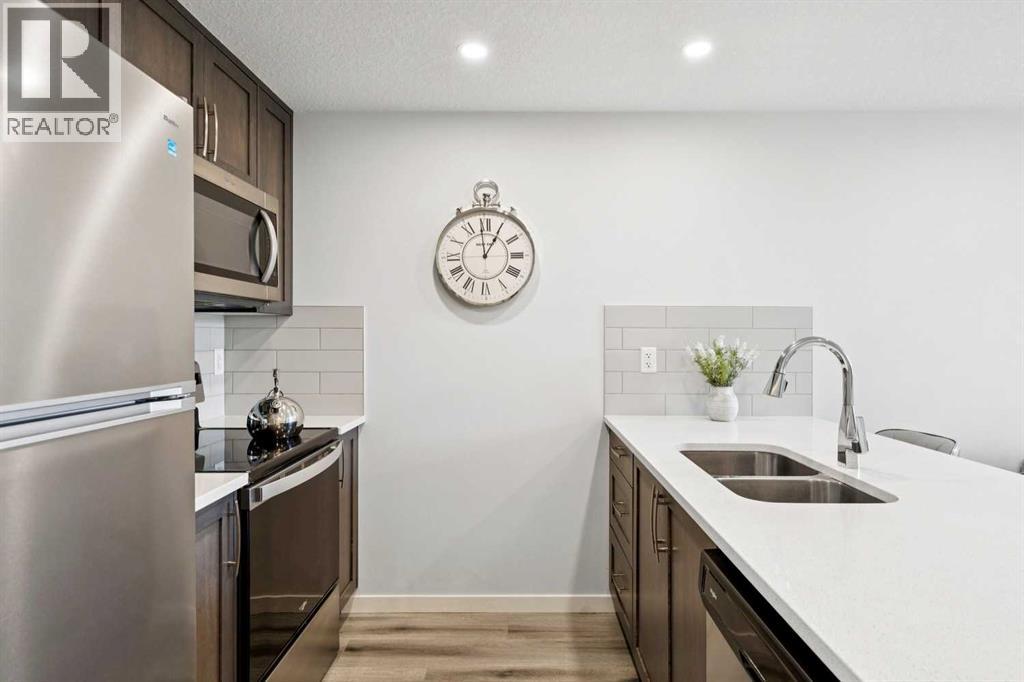 412, 260 Rowley Way NW, Calgary — photo 7