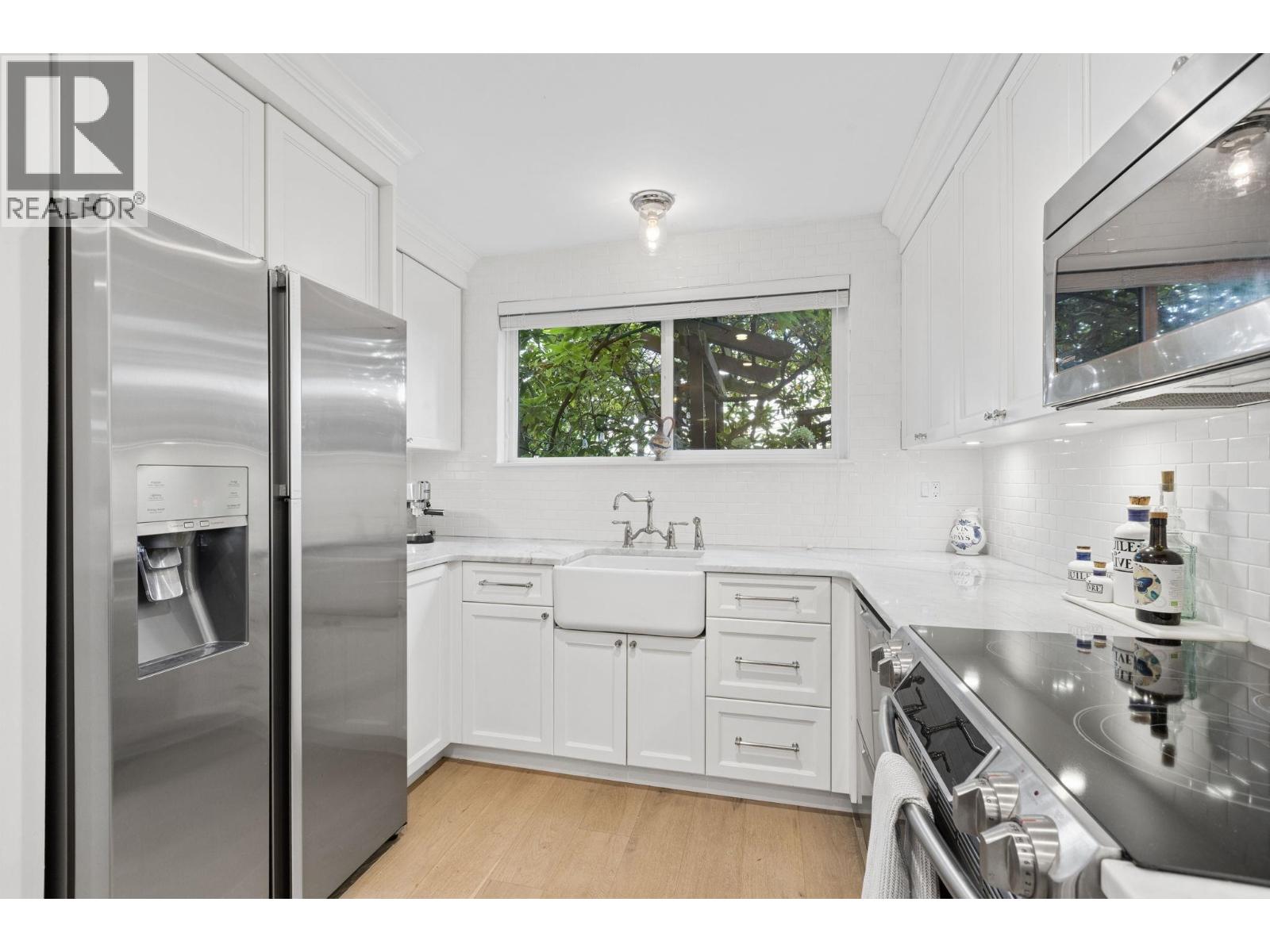 104 2211 WEST 2ND AVE, Vancouver