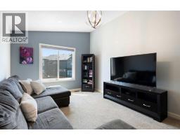 Family room - 642 Kingsmere Way Se, Airdrie, AB T4A0X7 Photo 12
