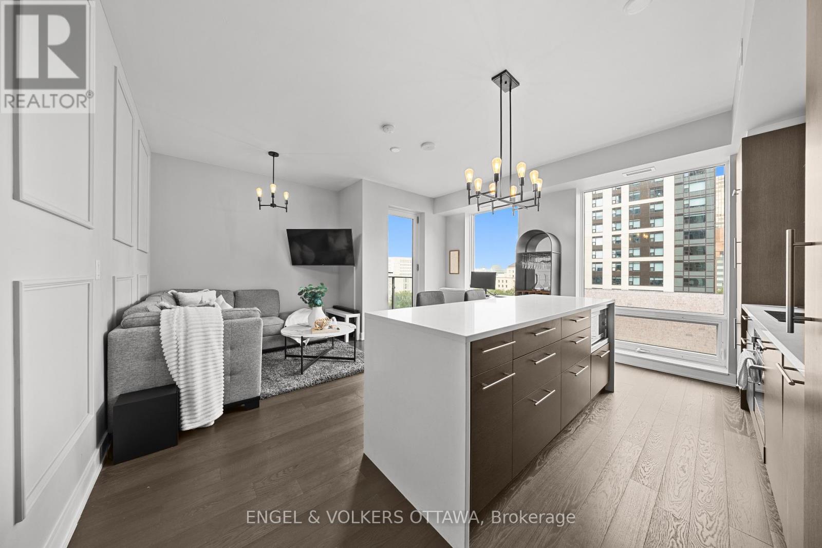 Open concept living area with 9 foot ceilings