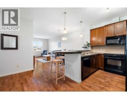 Living room - 310, 25 Prestwick Drive Se, Calgary, AB T2Z4Z1 Photo 6