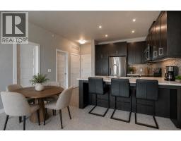 Dining room - 401, 145 Burma Star Road Sw, Calgary, AB T4C8A8 Photo 7