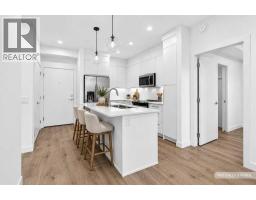 Laundry room - 2412, 265 Wolf Willow Boulevard Se, Calgary, AB T2X6R1 Photo 8